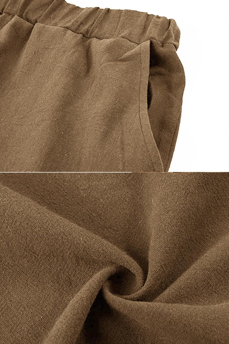 close-up of brown 100% cotton linen fabric and elastic waistband pants detail