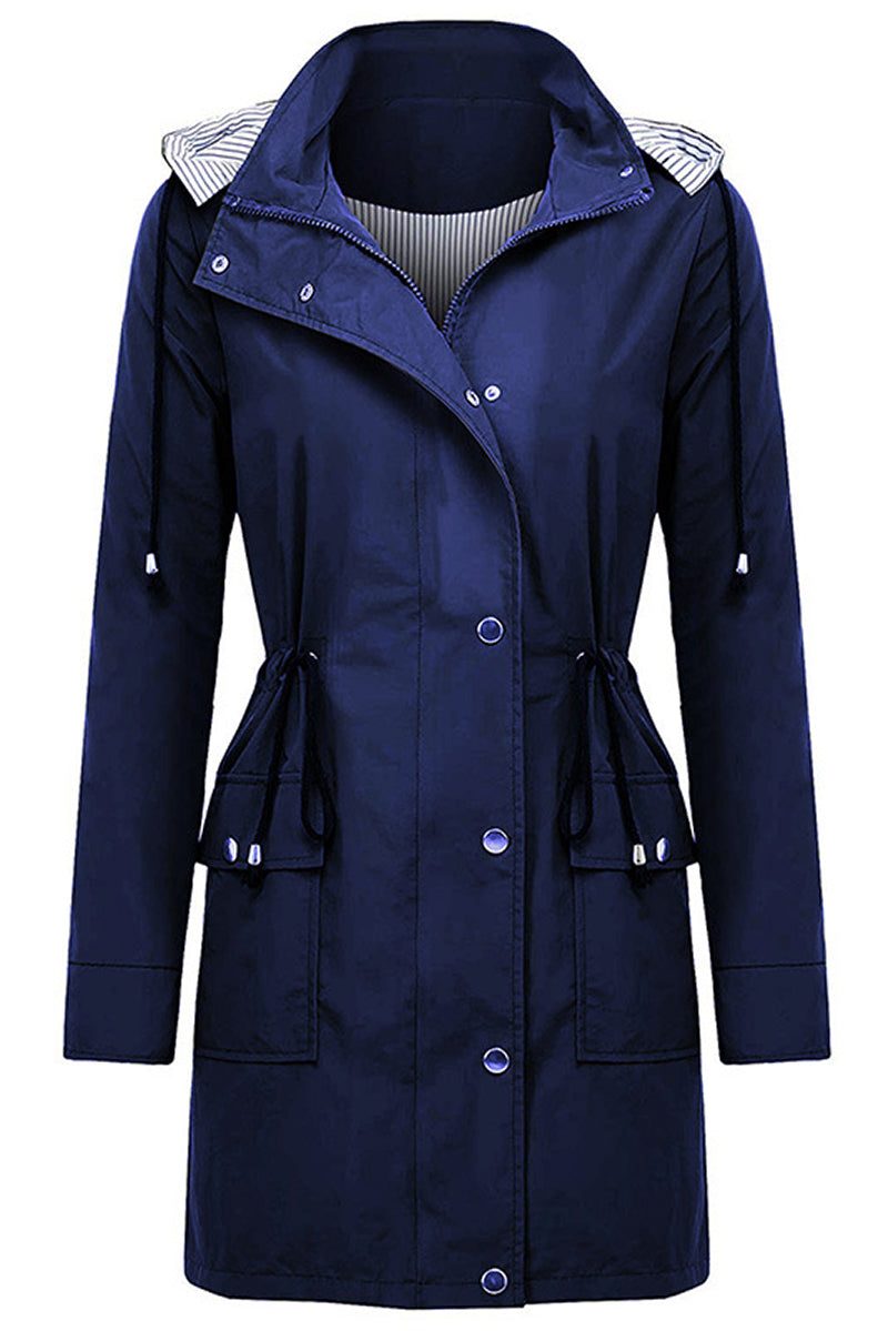 Women's navy water resistant windbreaker jacket with hood and striped inner lining, featuring oversized fit and multiple pockets.