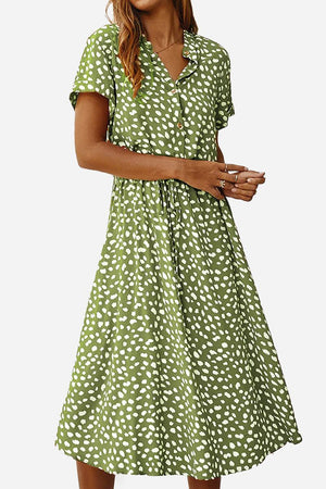 Green casual bohemian dress skirt with white dot print, short sleeves, and button-up front