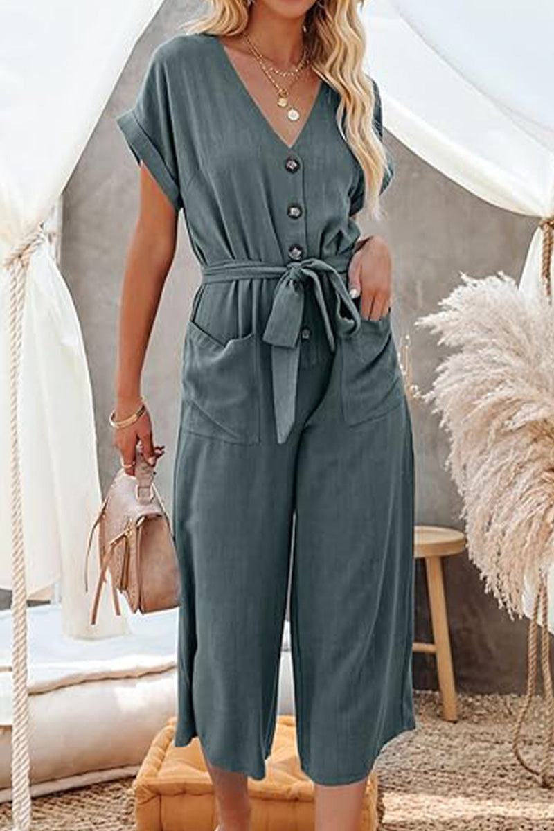 Womenās V-neck lace-up pocket jumpsuit with tie waist in lightweight fabric