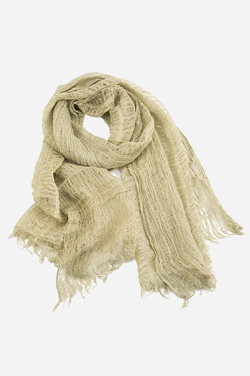 beige lightweight linen scarf with frayed edges on white background