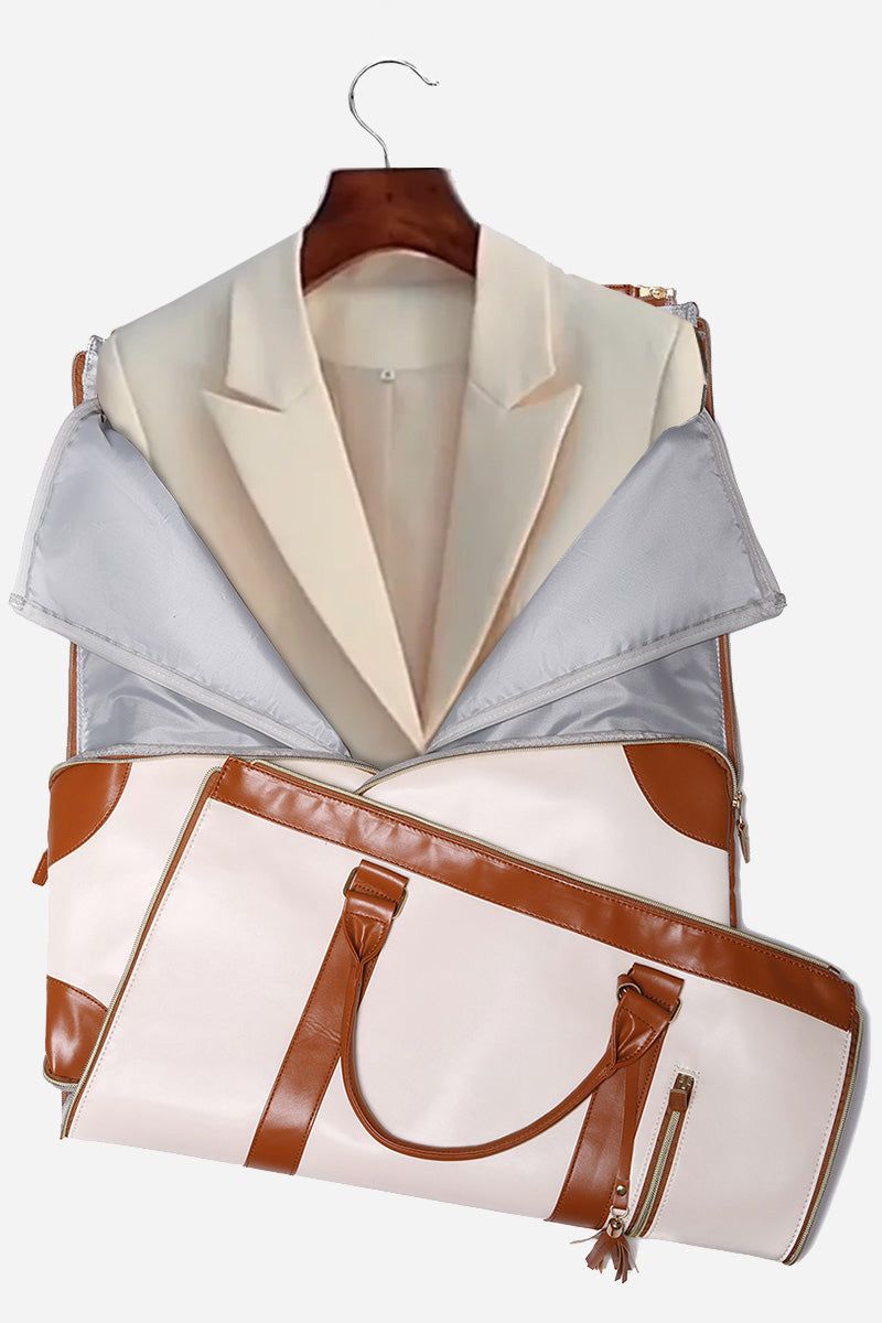 No-Wrinkle Foldable Travel Bag in beige and brown PU leather holding a cream blazer on hanger, designed for wrinkle-free garment carrying and travel organization