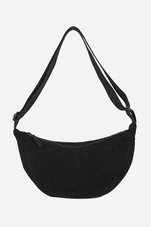 Black corduroy shoulder bag with adjustable strap and zip closure, lightweight and spacious design.