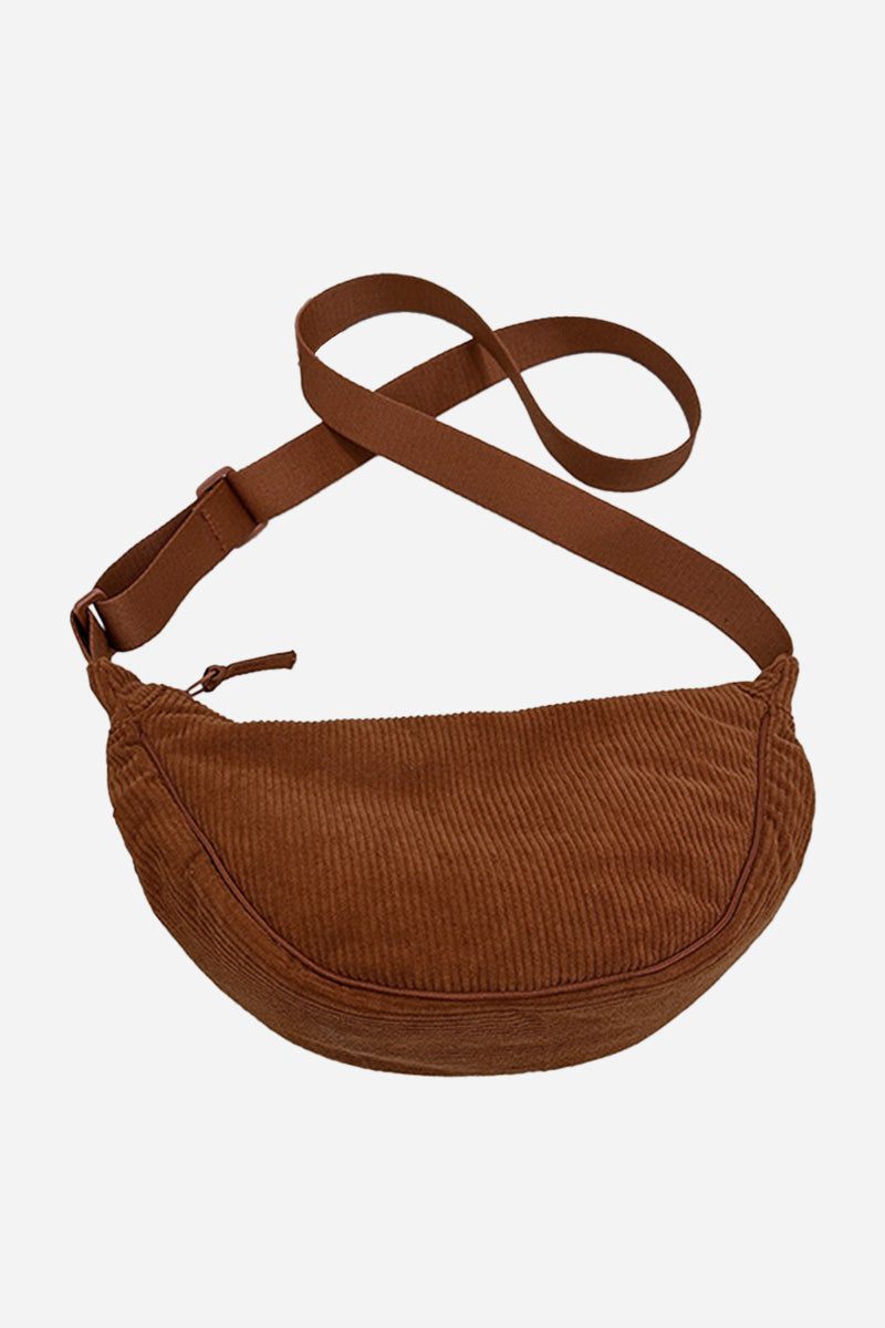 Brown corduroy shoulder bag with adjustable strap and zip closure, lightweight and roomy design