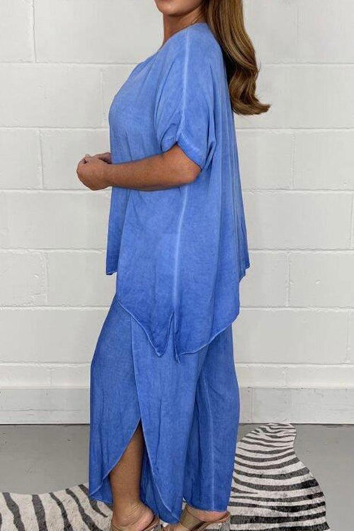 Relaxed linen-like travel 2-piece set in blue, lightweight and wrinkle-resistant outfit for comfortable and stylish travel.