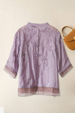 Lavender sheer embroidered cotton linen Tuscany blouse with layered hem and cuffs.