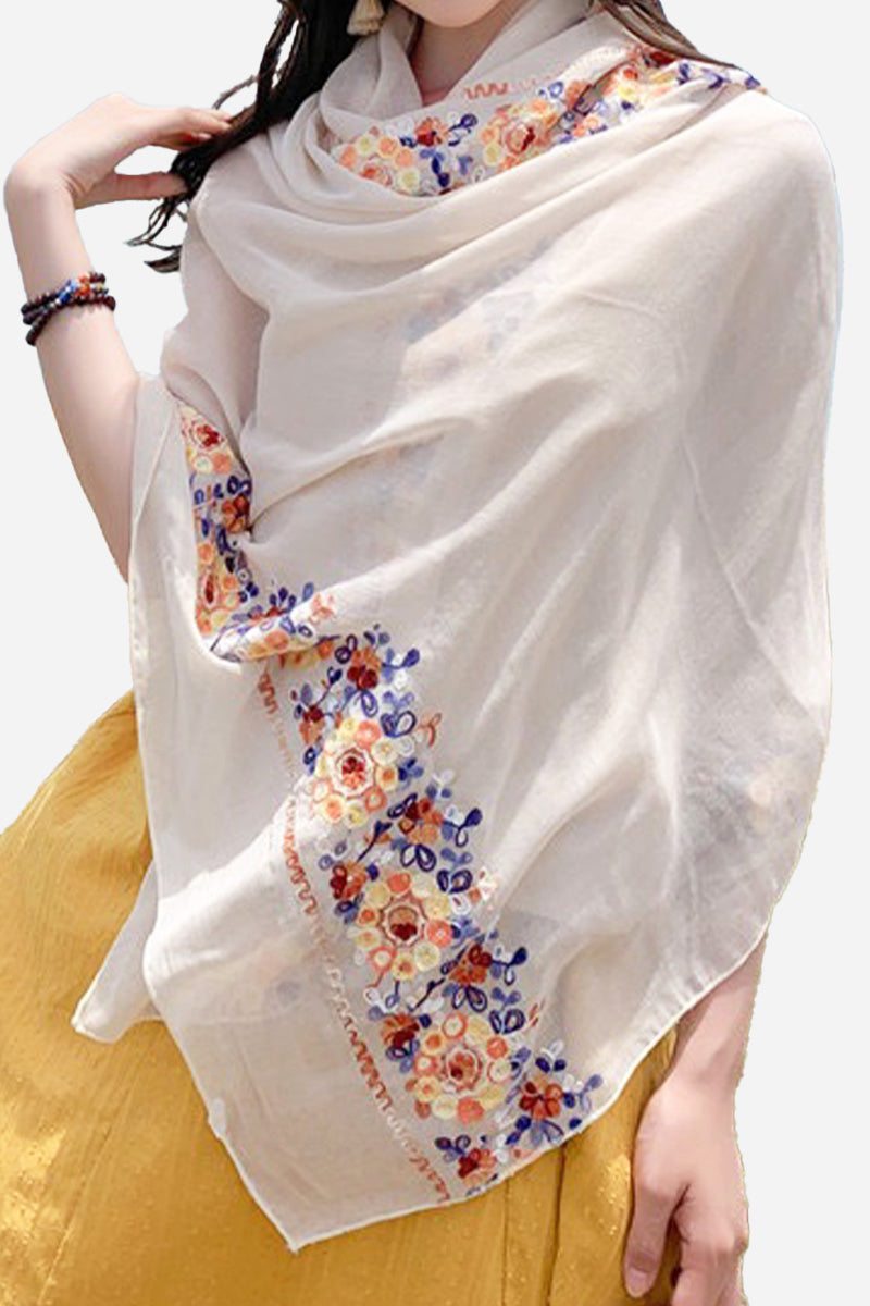 Lightweight embroidered travel-must shawl wrap with floral border, versatile and breathable accessory for travel and sun protection