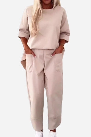 Beige relaxed fit two-piece set with crew neck sweatshirt and jogger pants with pockets