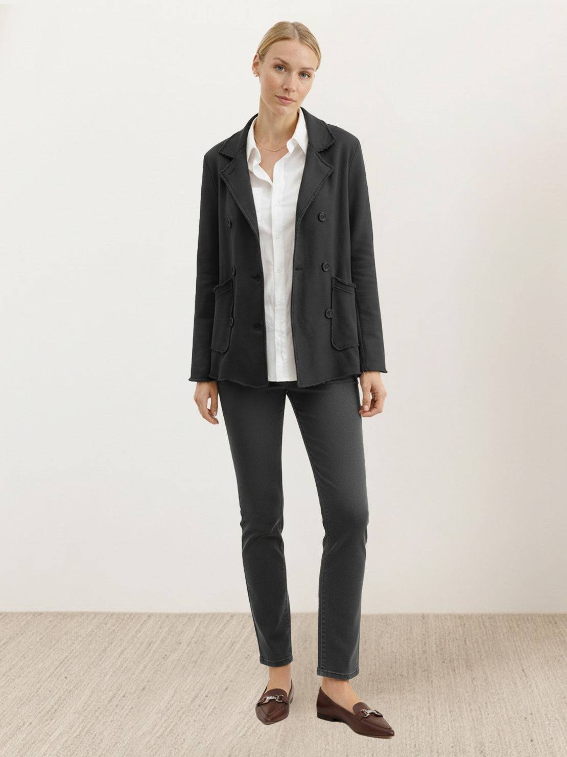 Modern double-breasted blazer with raw-edge seaming and cotton-blend fabric