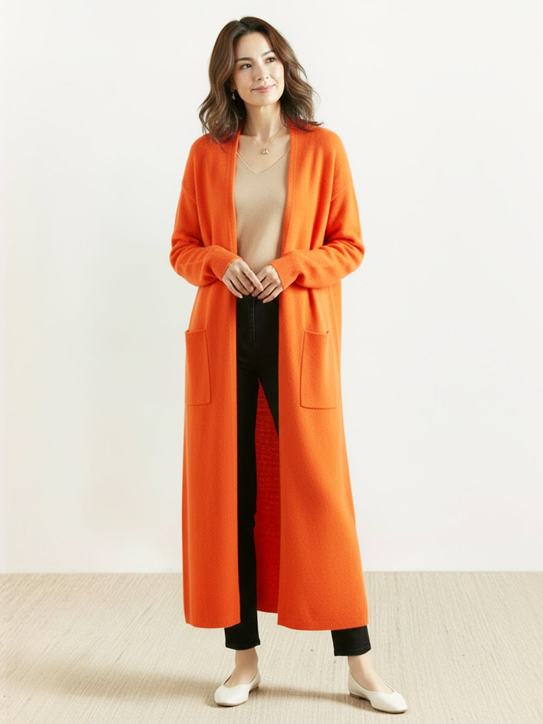 Long Australian Merino Wool cardigan with open front and patch pockets for versatile layering