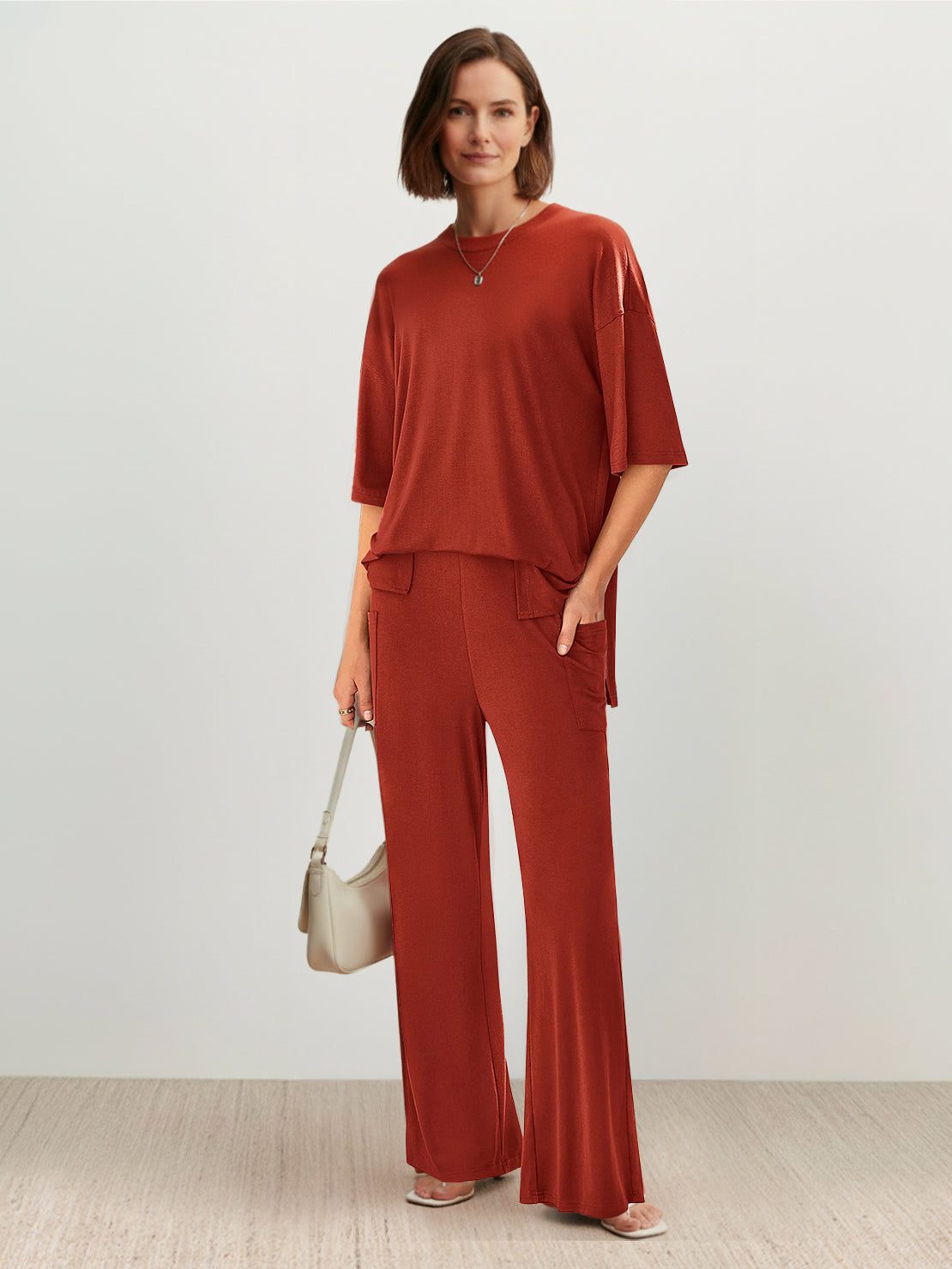 Oversized long-line loungewear set with pullover and straight-leg pants in soft knit fabric