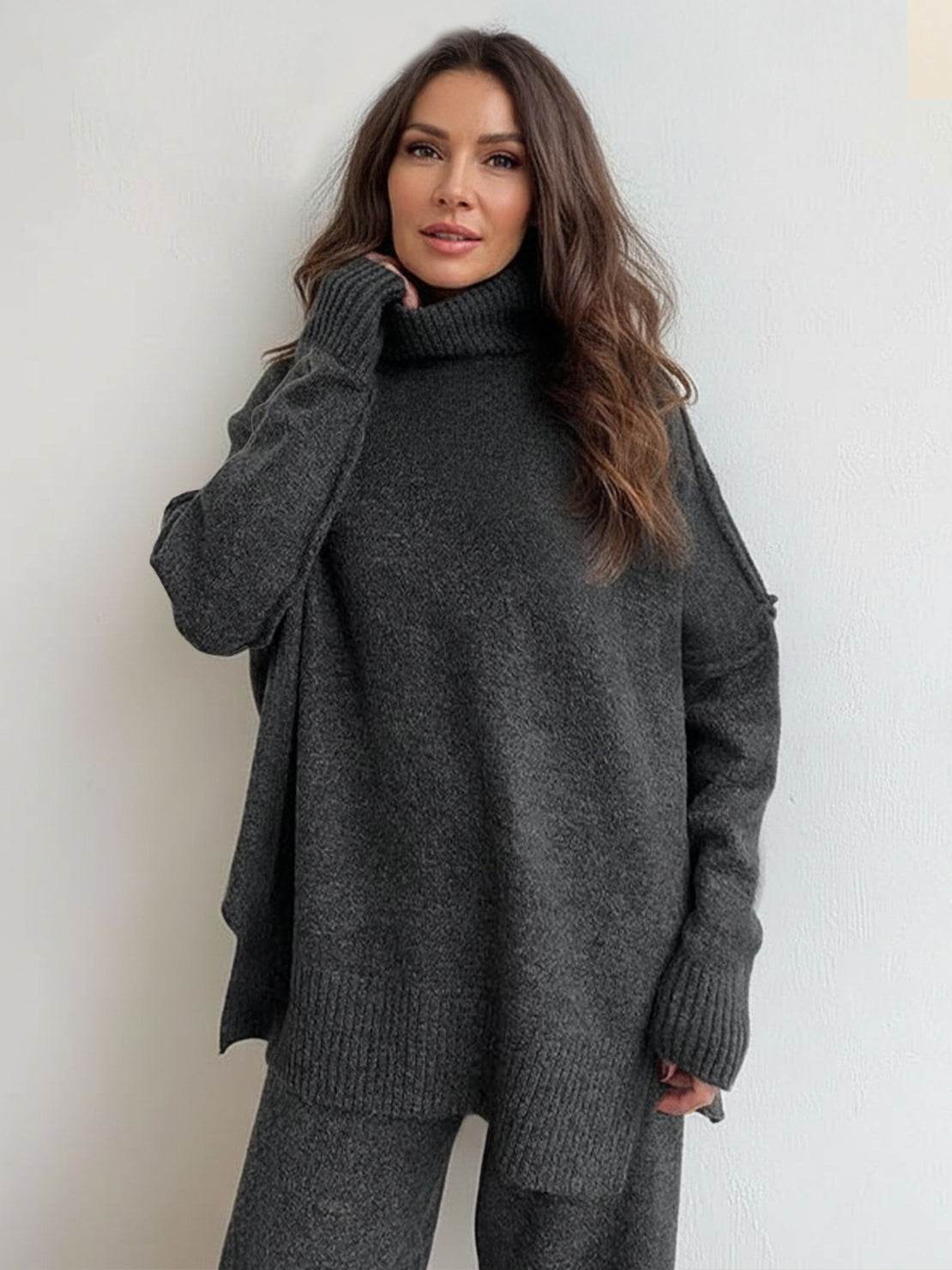 Woman wearing soft-knit turtleneck two-piece set with relaxed fit and wide-leg pants