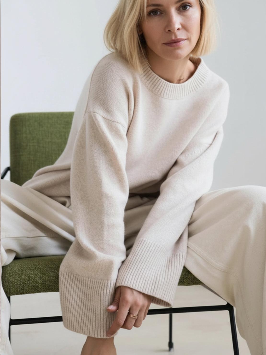oversized crew neck knit sweater with drop-shoulder sleeves and ribbed cuffs in neutral color