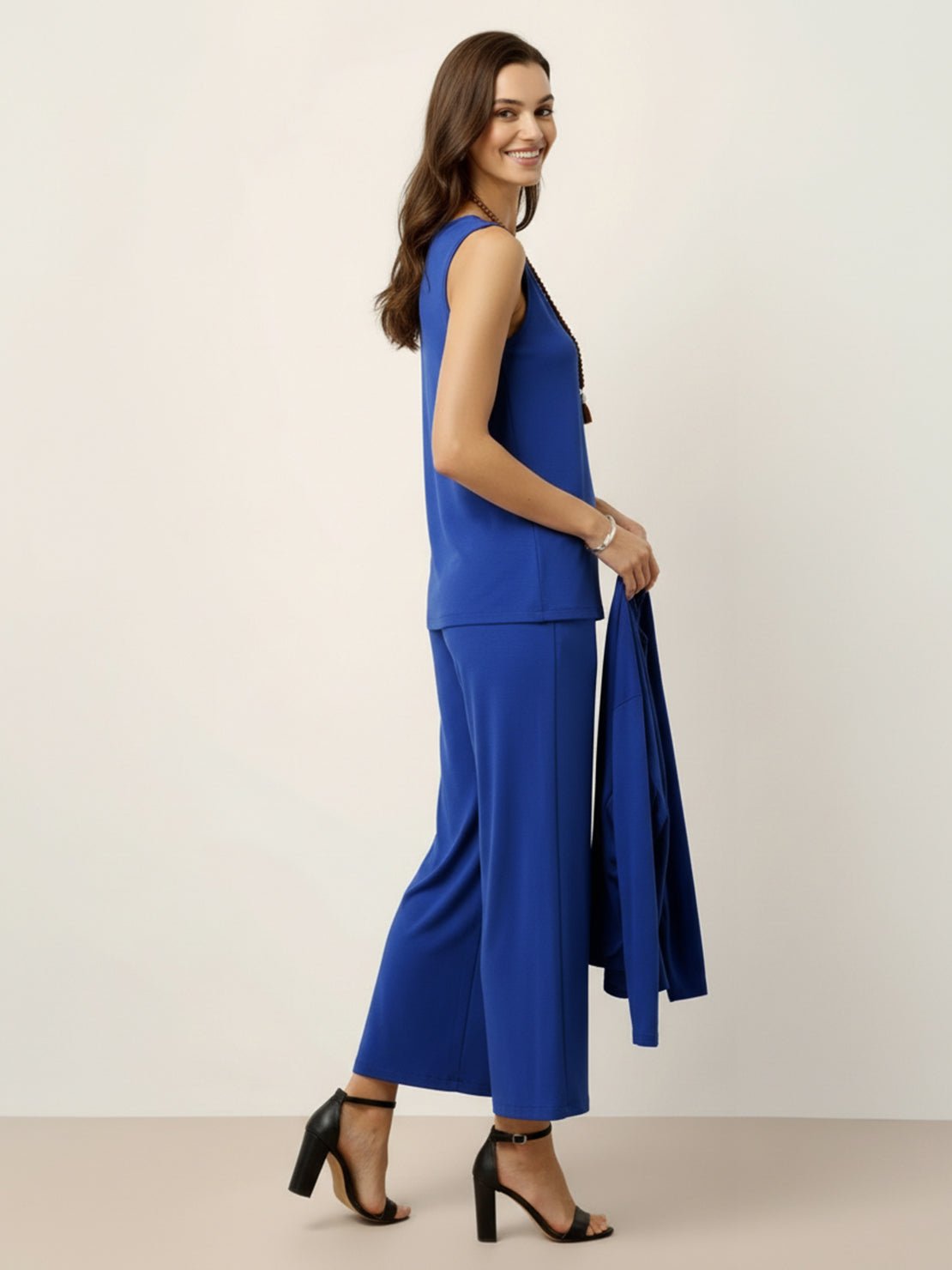 Open-front three-piece co-ord with longline cardigan, tank top, and wide-leg trousers in lightweight knit fabric