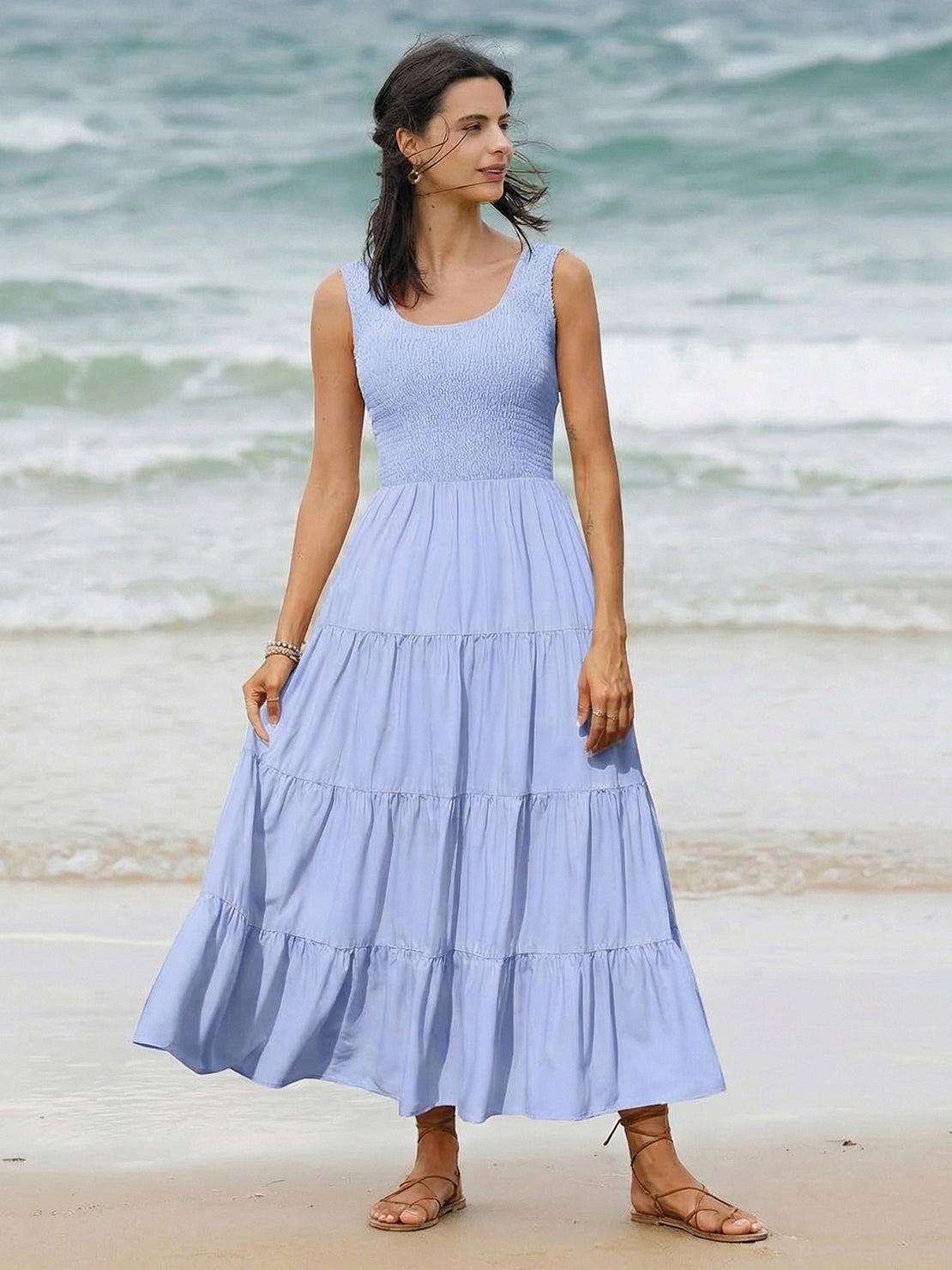 Smocked sleeveless maxi dress with tiered skirt and scoop neckline in lightweight fabric