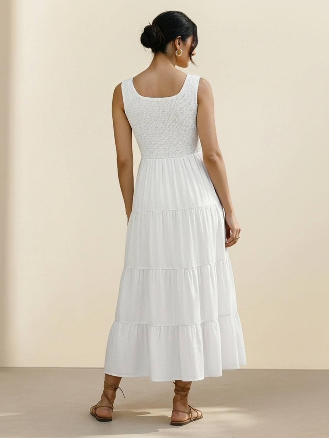 Smocked sleeveless maxi dress with tiered skirt and scoop neckline in lightweight fabric