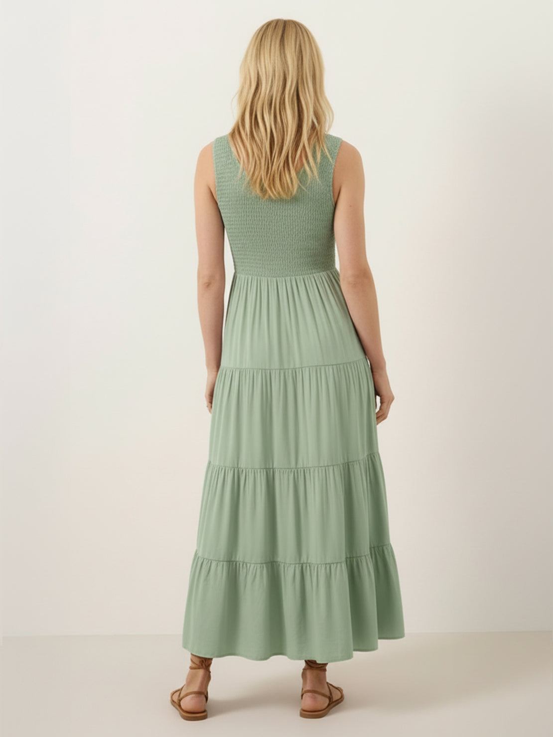 Smocked sleeveless maxi dress with tiered skirt and scoop neckline