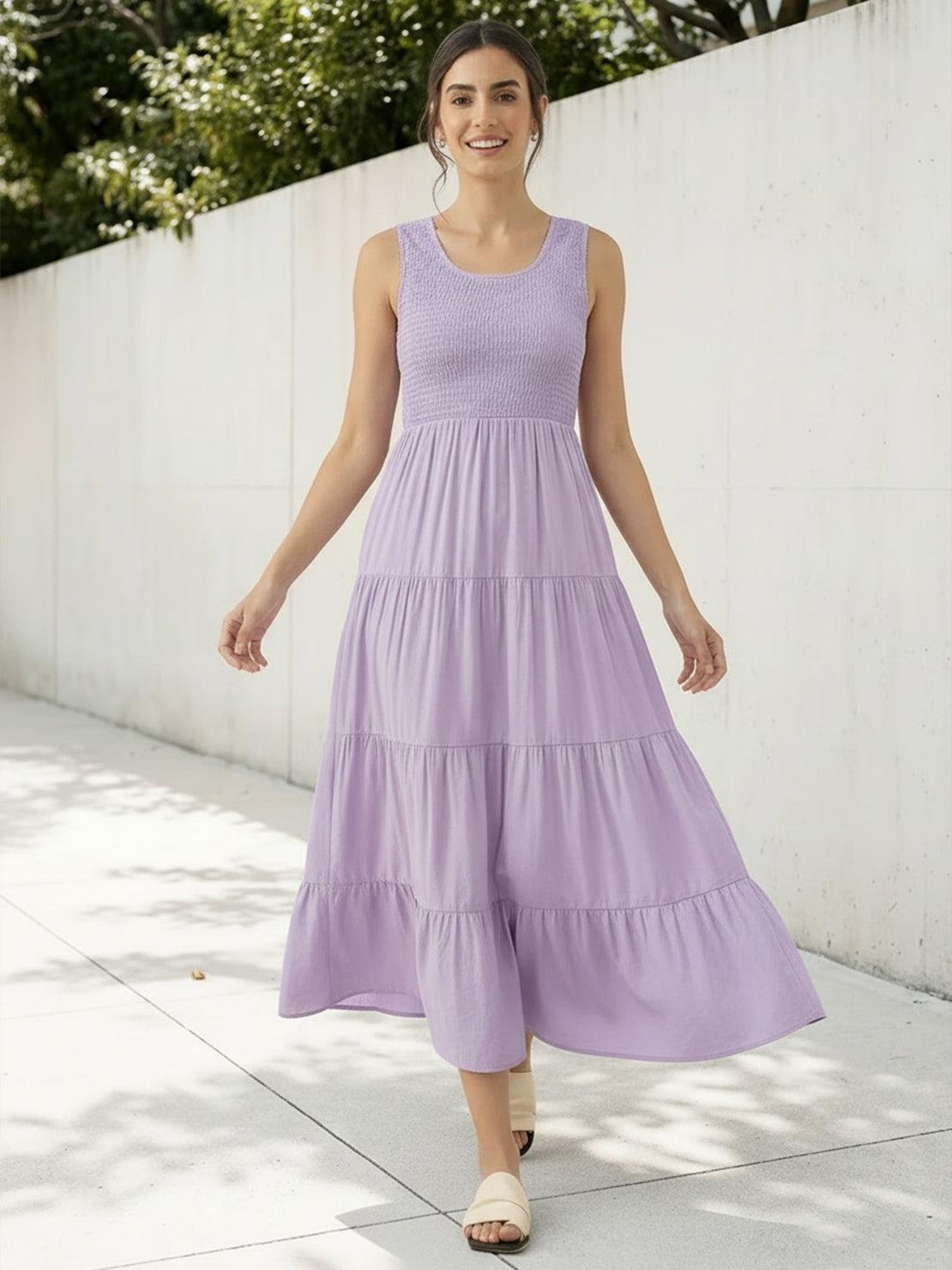 Smocked sleeveless maxi dress with tiered skirt and scoop neckline in lightweight fabric