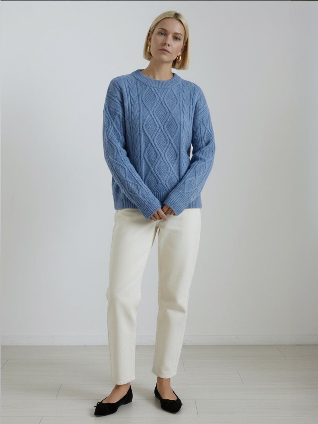 Oversized cable-knit crewneck sweater with dropped shoulders and ribbed trim in thick plush fabric