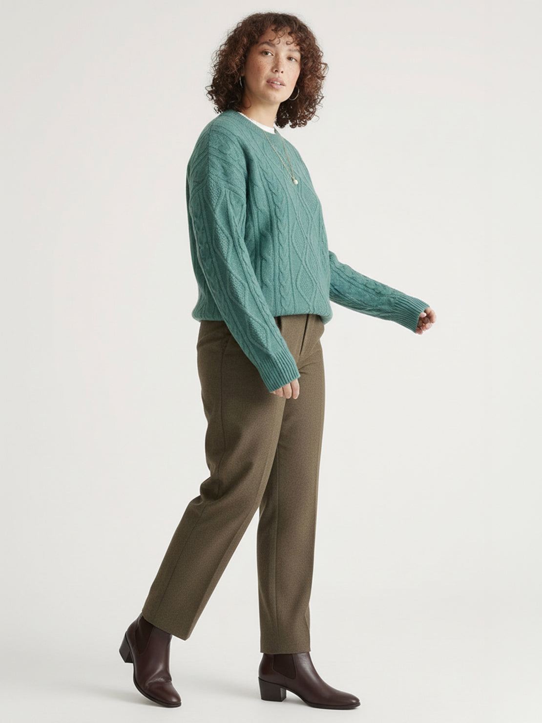 Oversized cable-knit crewneck sweater with dropped shoulders and ribbed trim in thick plush fabric