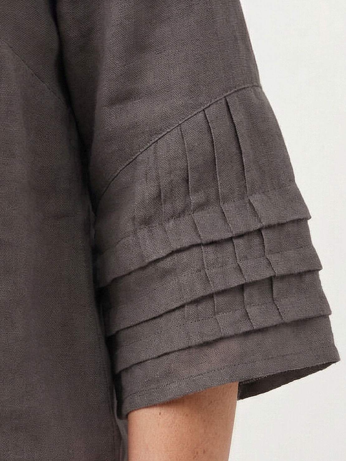 100% cotton two-piece wrap skirt and hip-length top set with crinkle texture and elastic waistband