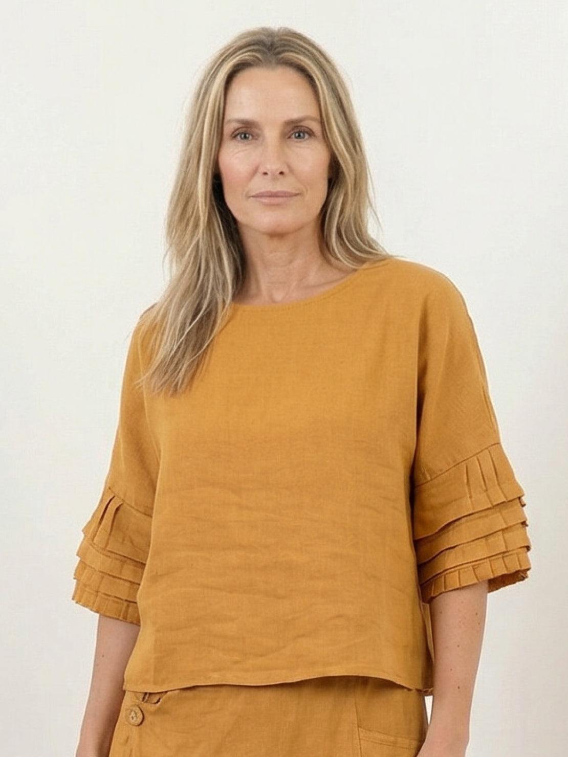 Women’s two-piece 100% cotton wrap-front skirt and hip-length top set with crinkle texture and elastic waistband