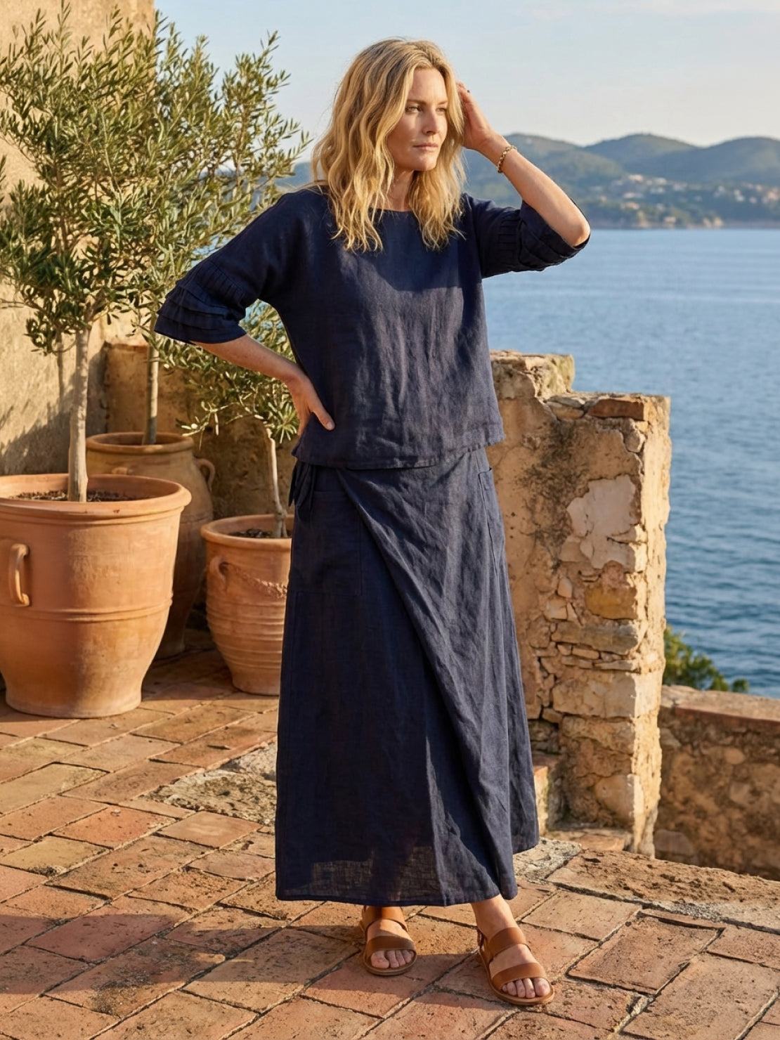 100% cotton two-piece wrap skirt and hip-length top set with crinkle texture and elastic waist