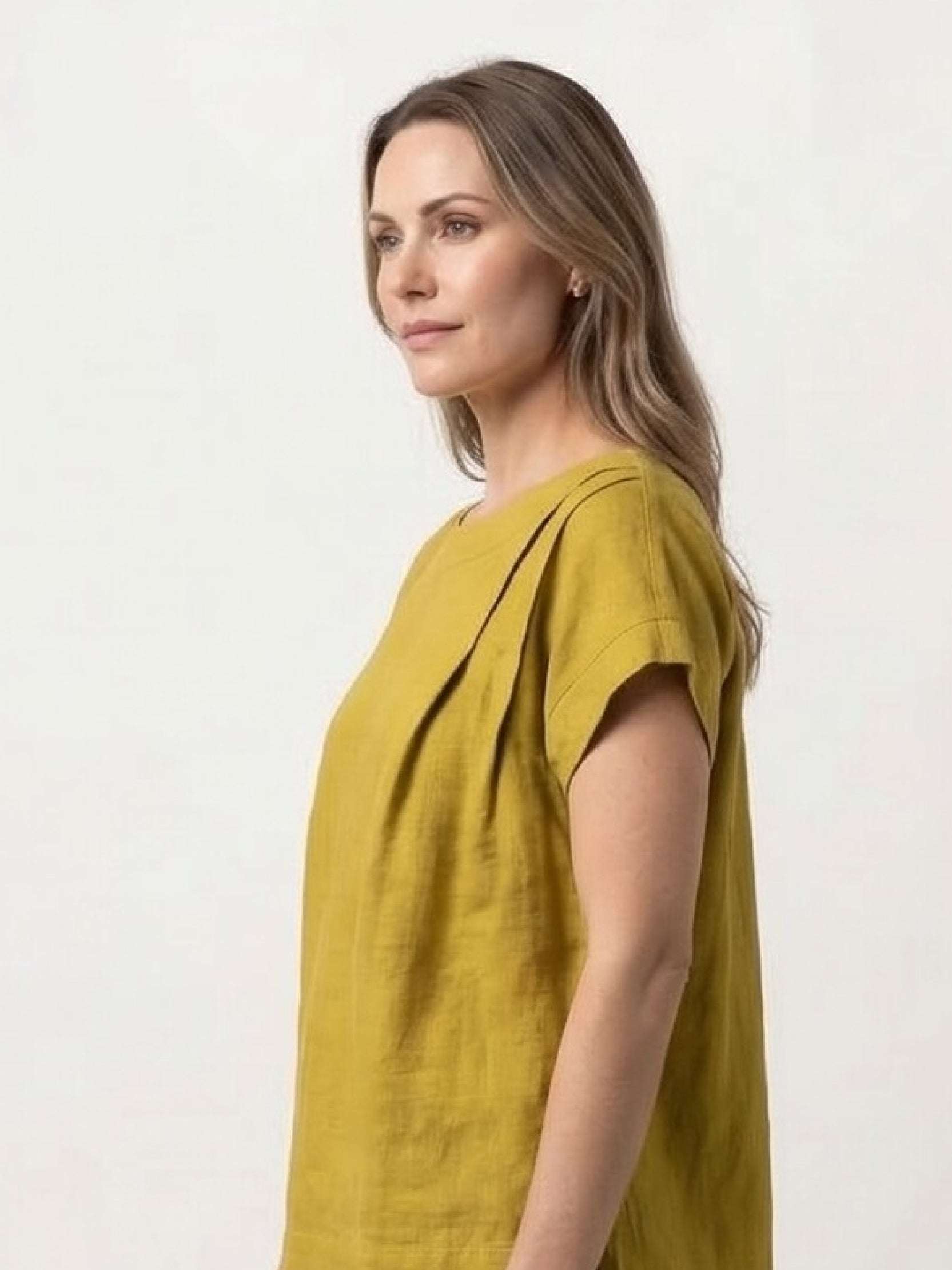 100% linen boxy cap-sleeve top with scoop neck and hip-length hem