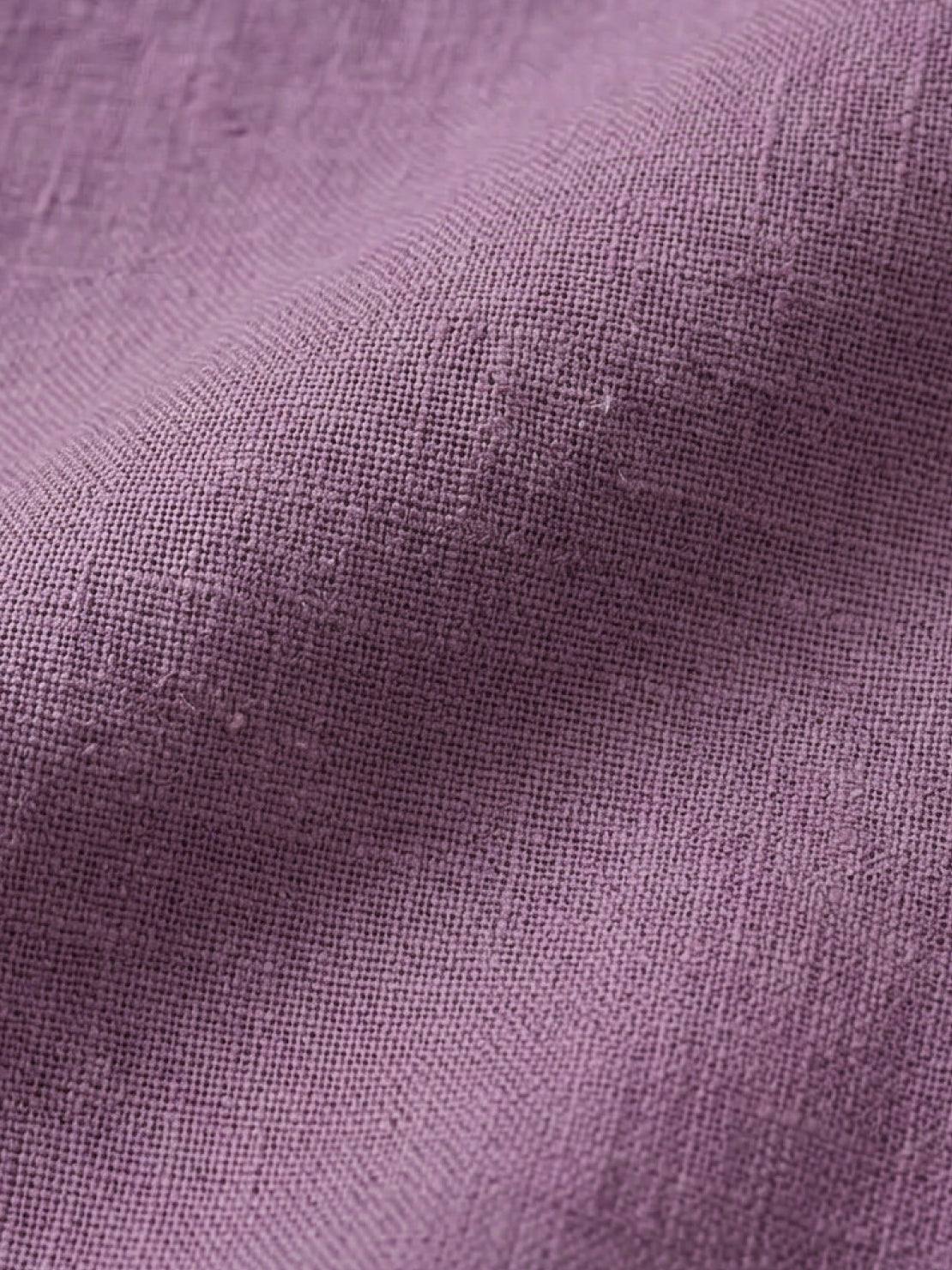 Lightweight sleeveless 100% cotton linen top with curved hem and chest pocket buttons