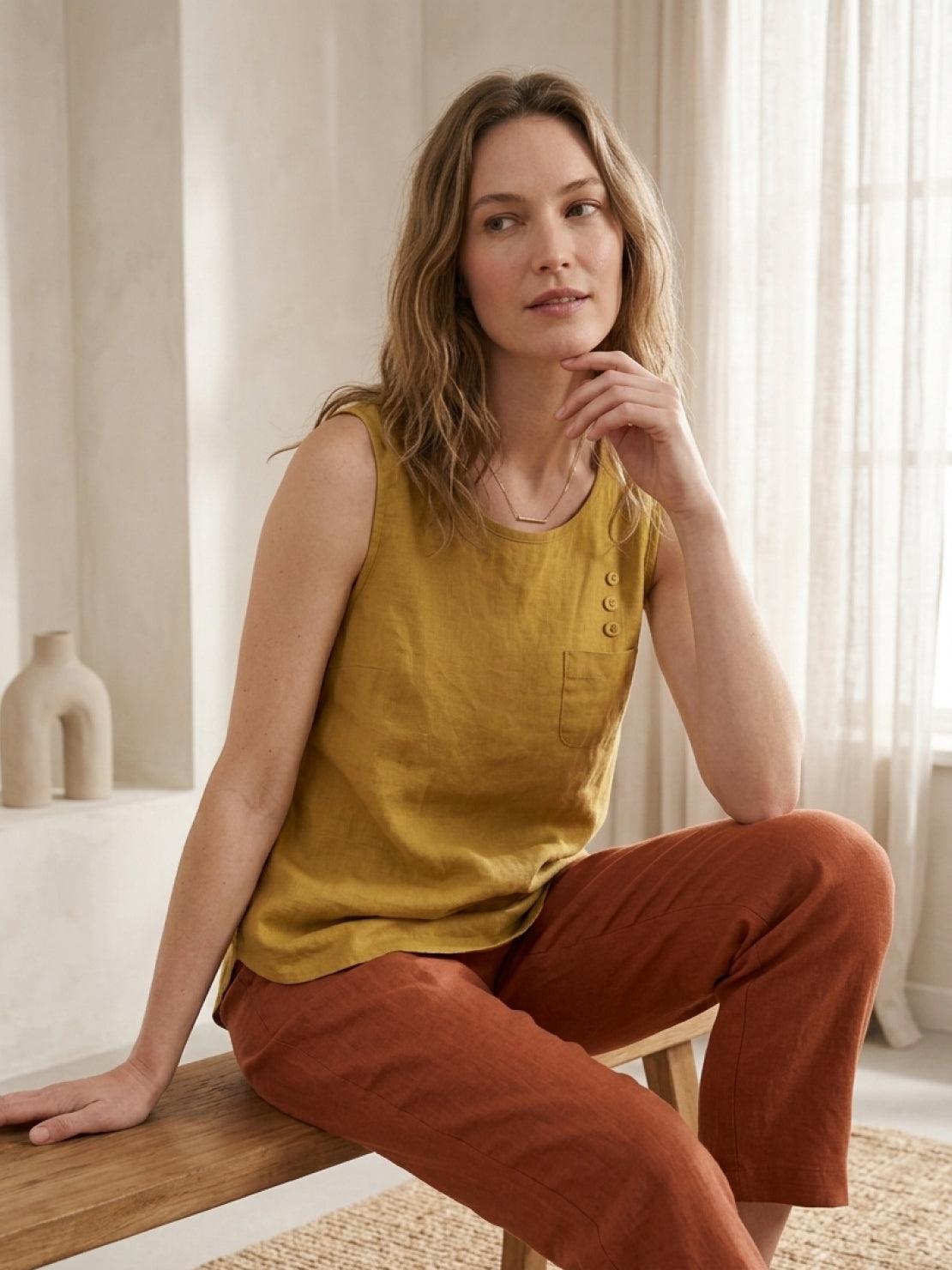 Lightweight sleeveless cotton linen top with chest pocket and curved hem