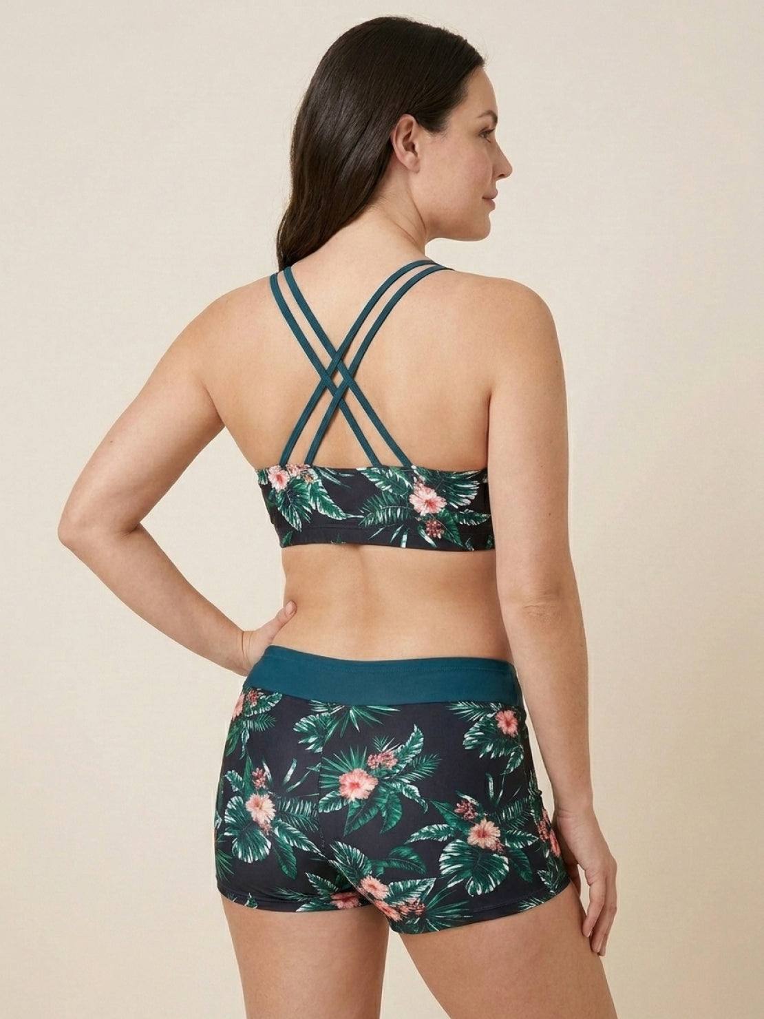 Three-piece tankini set with criss-cross back and printed sports bra and boy shorts