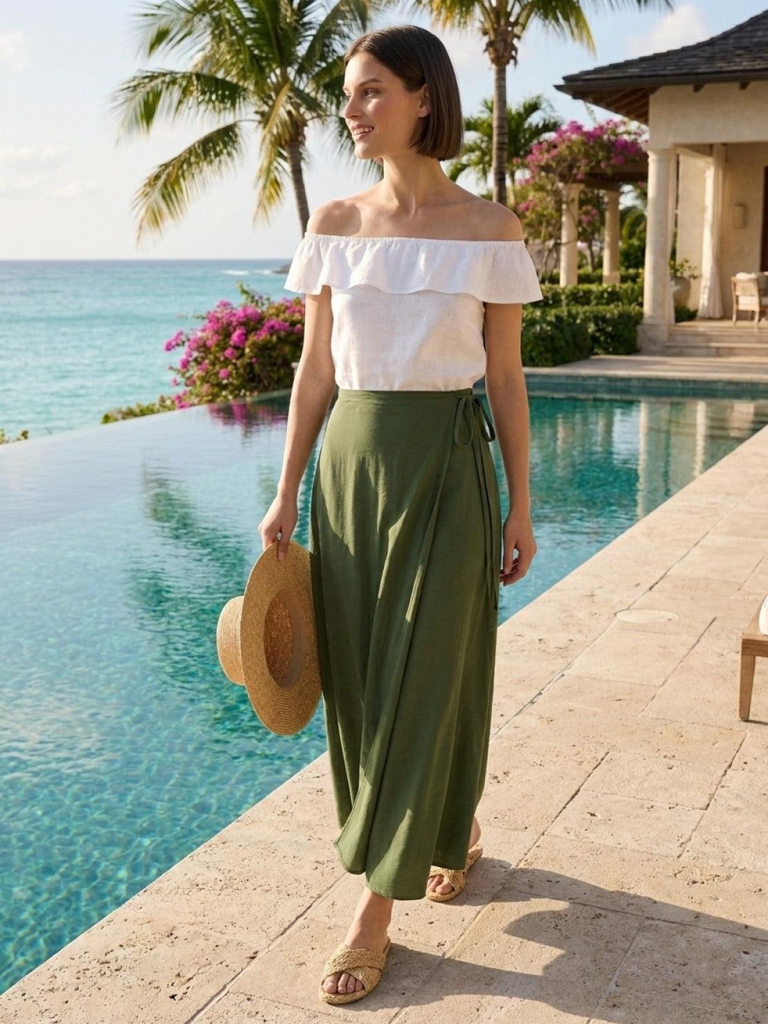 woman wearing asymmetrical wrap maxi skirt with side tie closure and flowing hem
