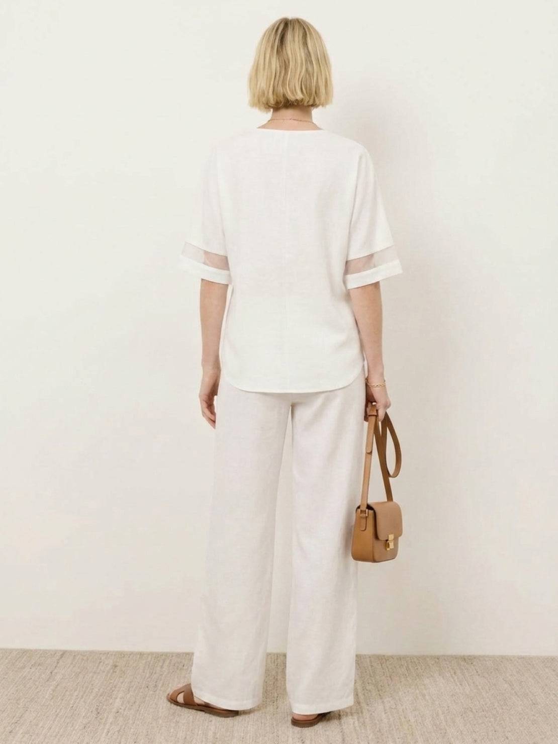 Lightweight linen top with V-neck and button detail for mature women
