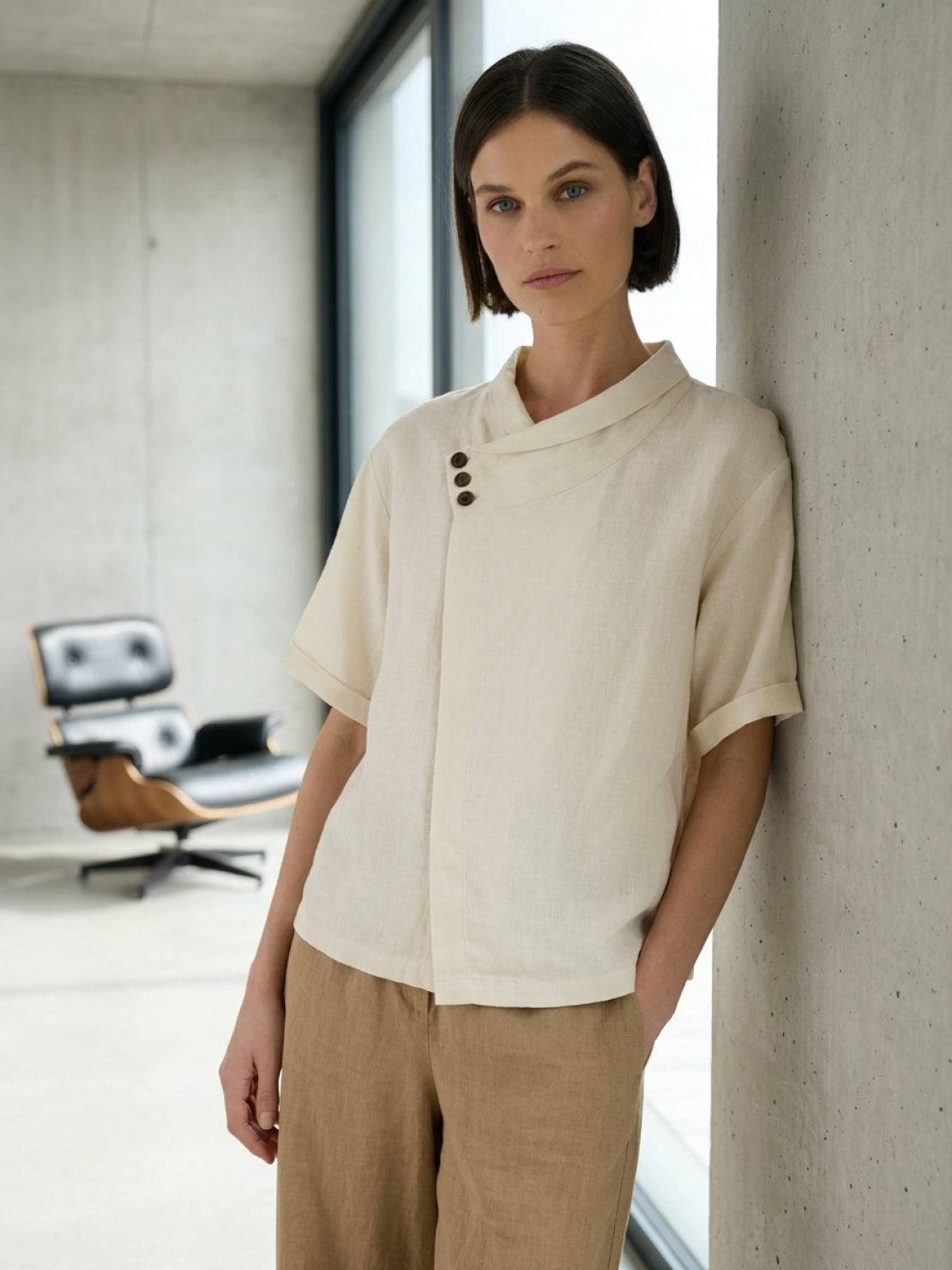 100% linen relaxed V-neck top with asymmetric button detail in navy blue