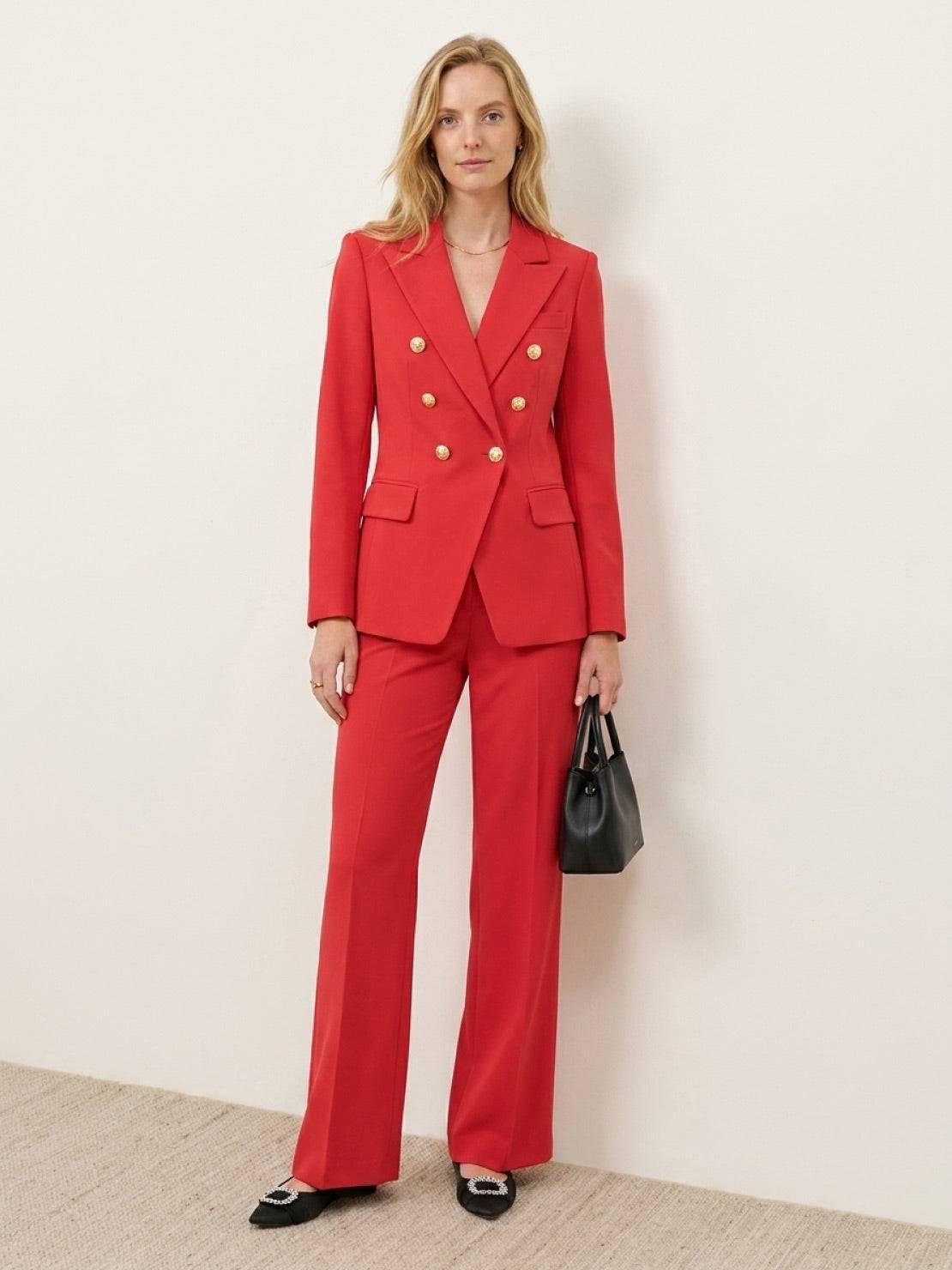 Double-breasted blazer and wide-leg trousers co-ord with gold lion-head buttons and structured suiting fabric