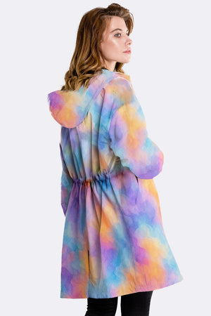 Water Resistant Oversized Windbreaker in pastel tie-dye pattern with hood and adjustable waist worn by woman