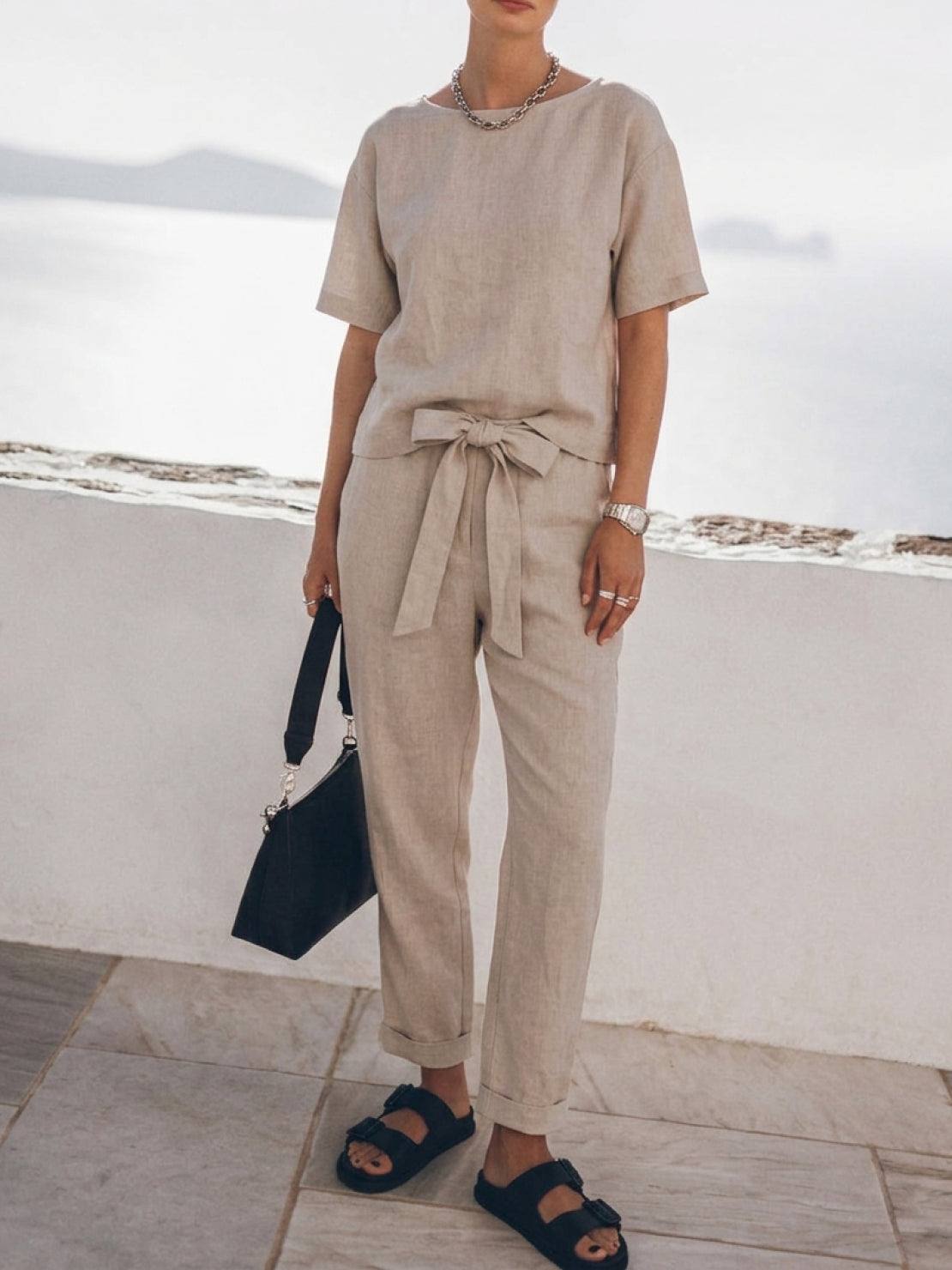 Cotton-linen set three-piece capsule in soft breathable monochrome fabric with relaxed fit top and straight-leg pants
