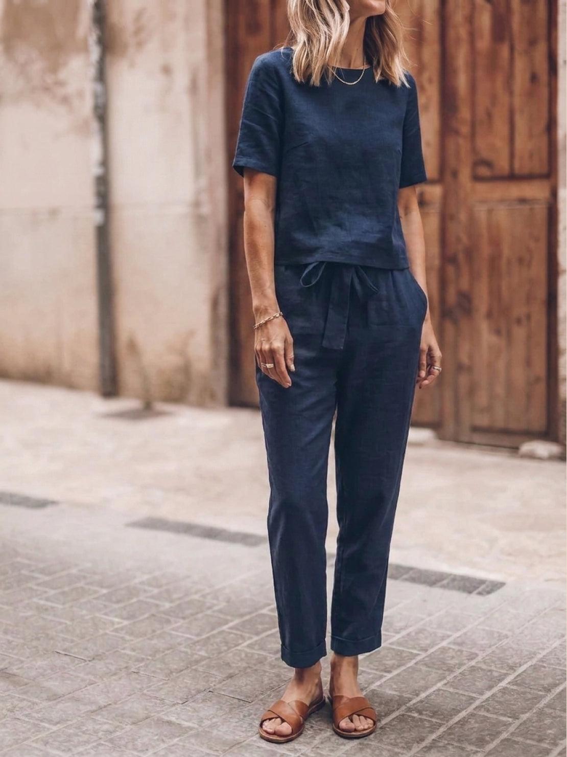 Relaxed cotton-linen set featuring short-sleeve top and straight-leg pants in monochrome textured fabric