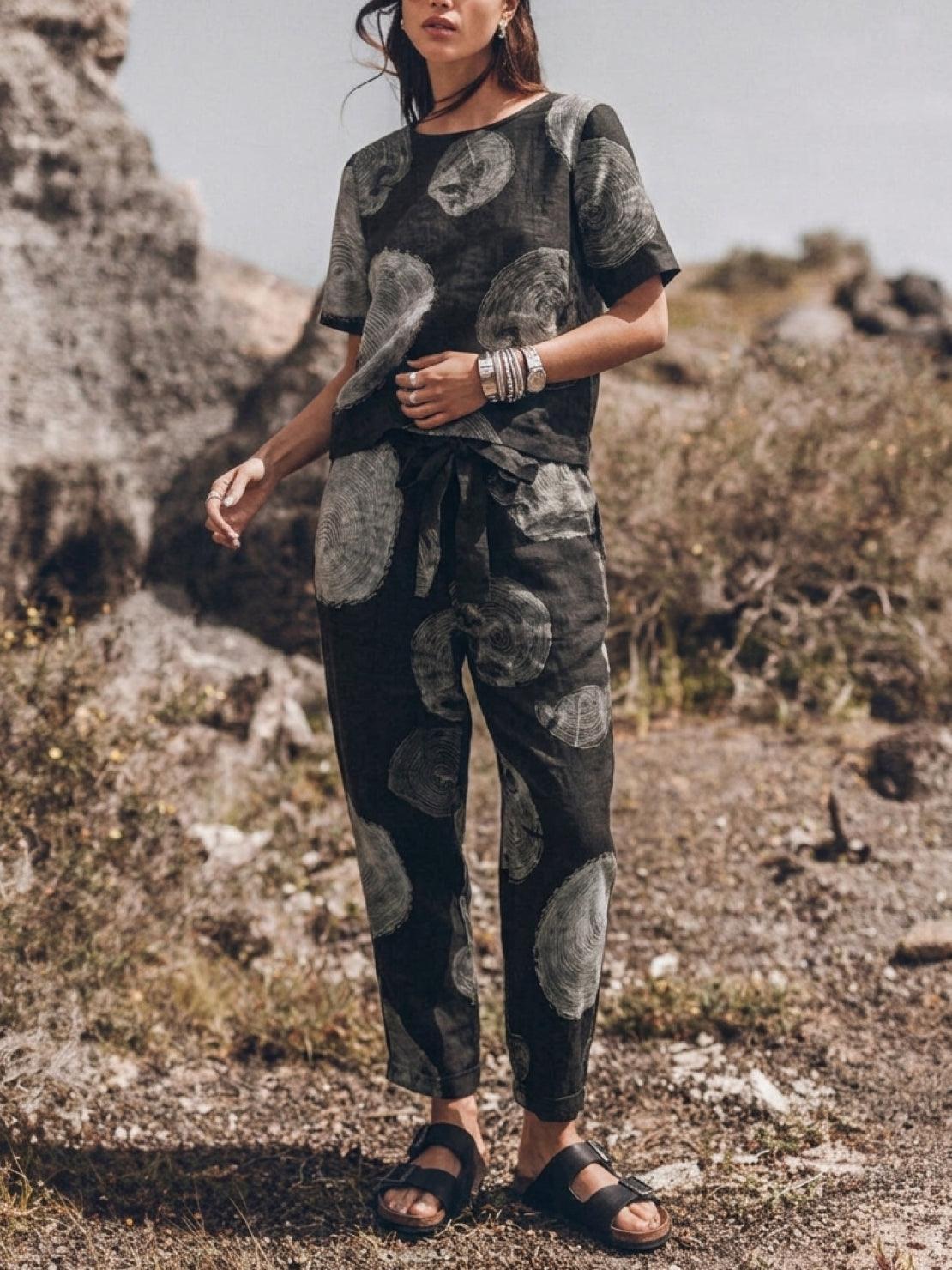 Cotton-linen set in soft breathable fabric with relaxed short-sleeve top and straight-leg pants in monochrome tones