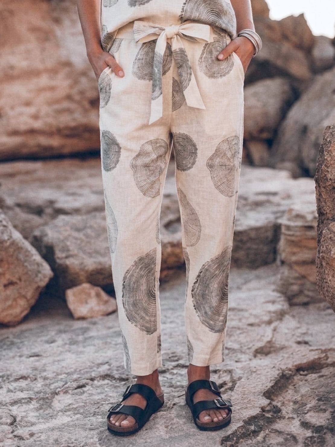 Three-piece cotton-linen set with relaxed short-sleeve top and straight-leg pants in a breathable monochrome blend