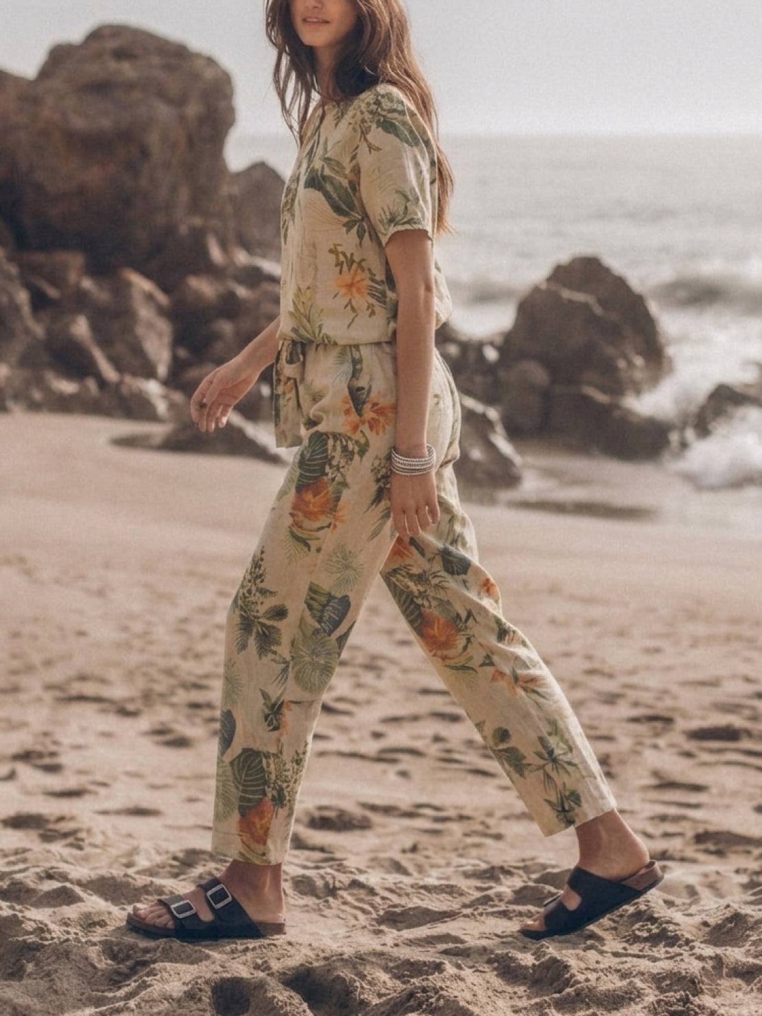 Cotton-linen monochrome two-piece set with relaxed short-sleeve top and straight-leg pants in natural textured fabric