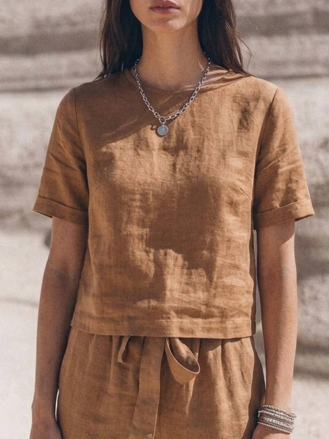 Cotton-linen set with relaxed short-sleeve top and straight-leg pants in breathable monochrome fabric