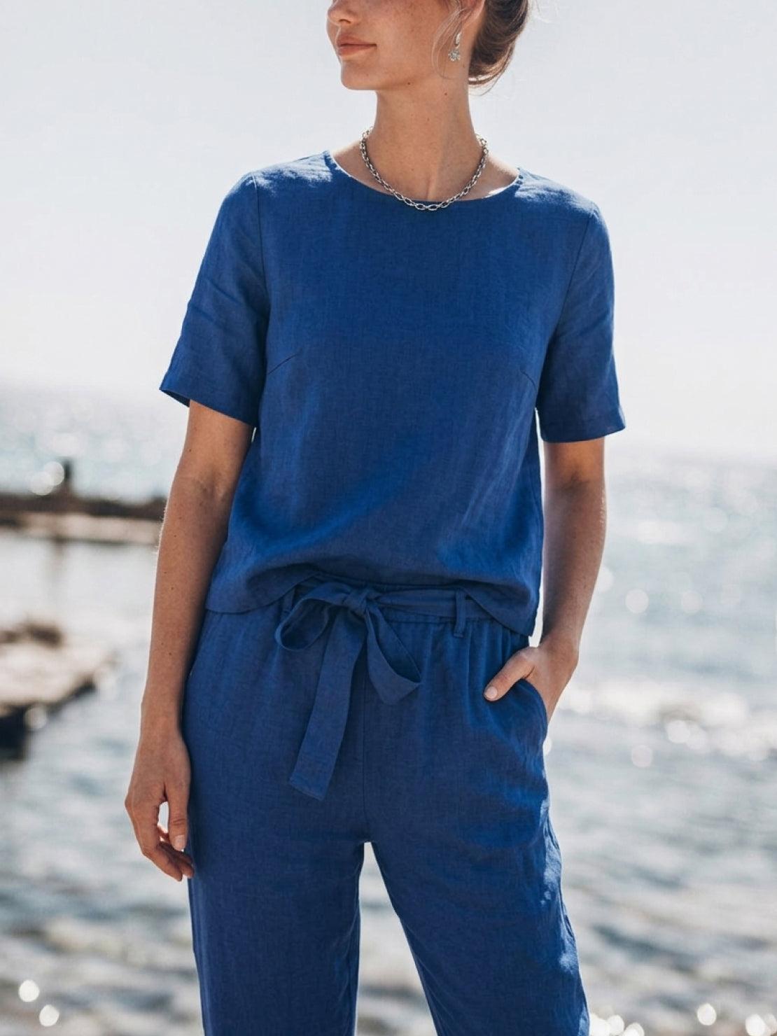 Cotton-linen set featuring relaxed short-sleeve top and straight-leg pants in breathable monochrome fabric