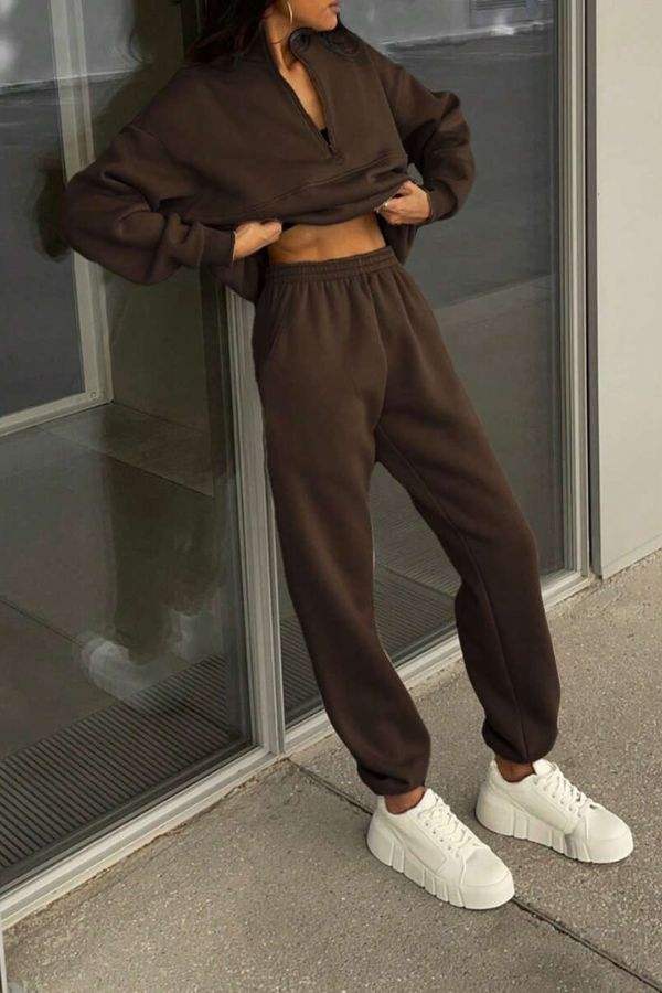 Classic Airplane Set brown cotton blend two-piece tracksuit with pullover and joggers, styled with white sneakers.