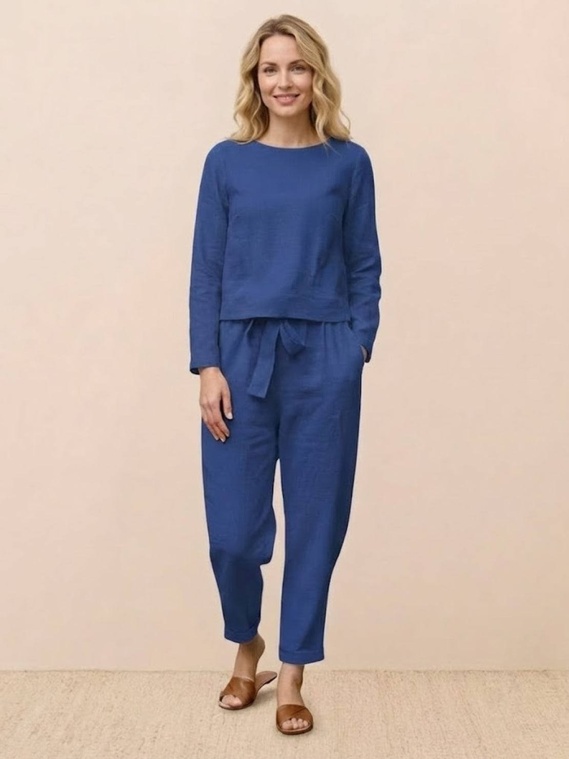 Woman wearing relaxed cotton-linen monochrome longline top and wide-leg pants set