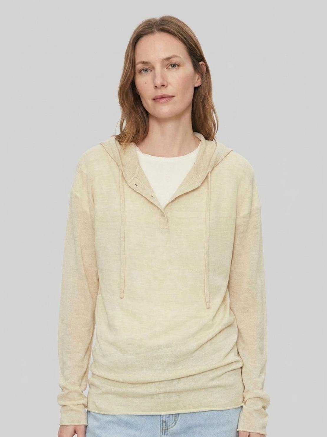 Organic linen henley top with fine knit, relaxed fit, and side slits in neutral heathered fabric