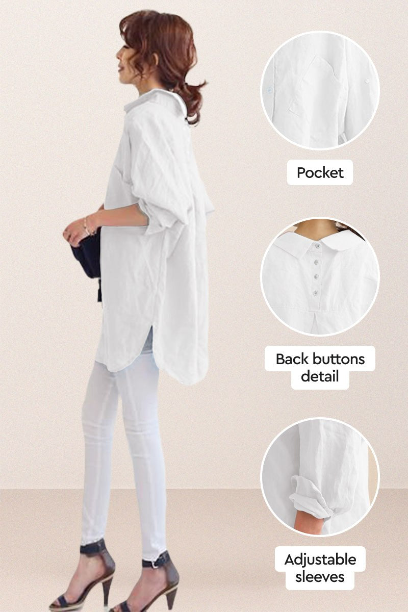 Woman wearing a white oversized linen shirt with pocket, back buttons detail, and adjustable sleeves from Christmas collection