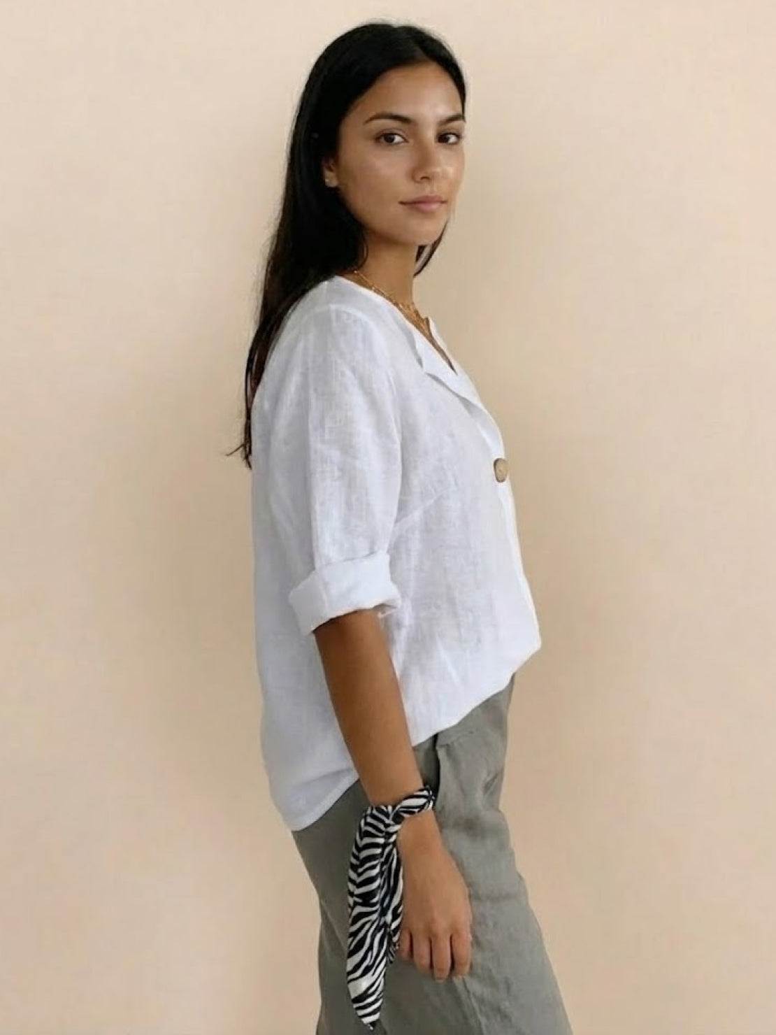 Pure linen age-defying shirt with button detail, breathable and soft fabric, perfect fit for mature skin.