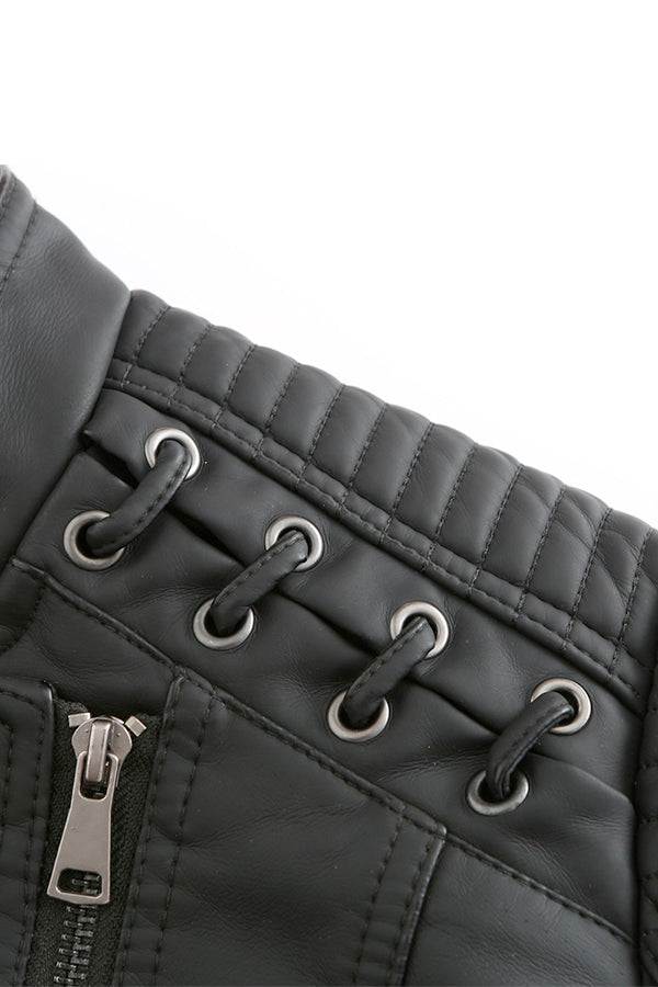 Close-up of slim fit leather motorcycle jacket with quilted shoulder and zipper details