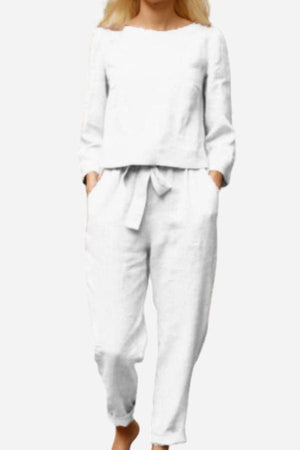 Retro monochrome linen two-piece set with breathable cotton blend, featuring a sleek minimalist design and comfortable fit.